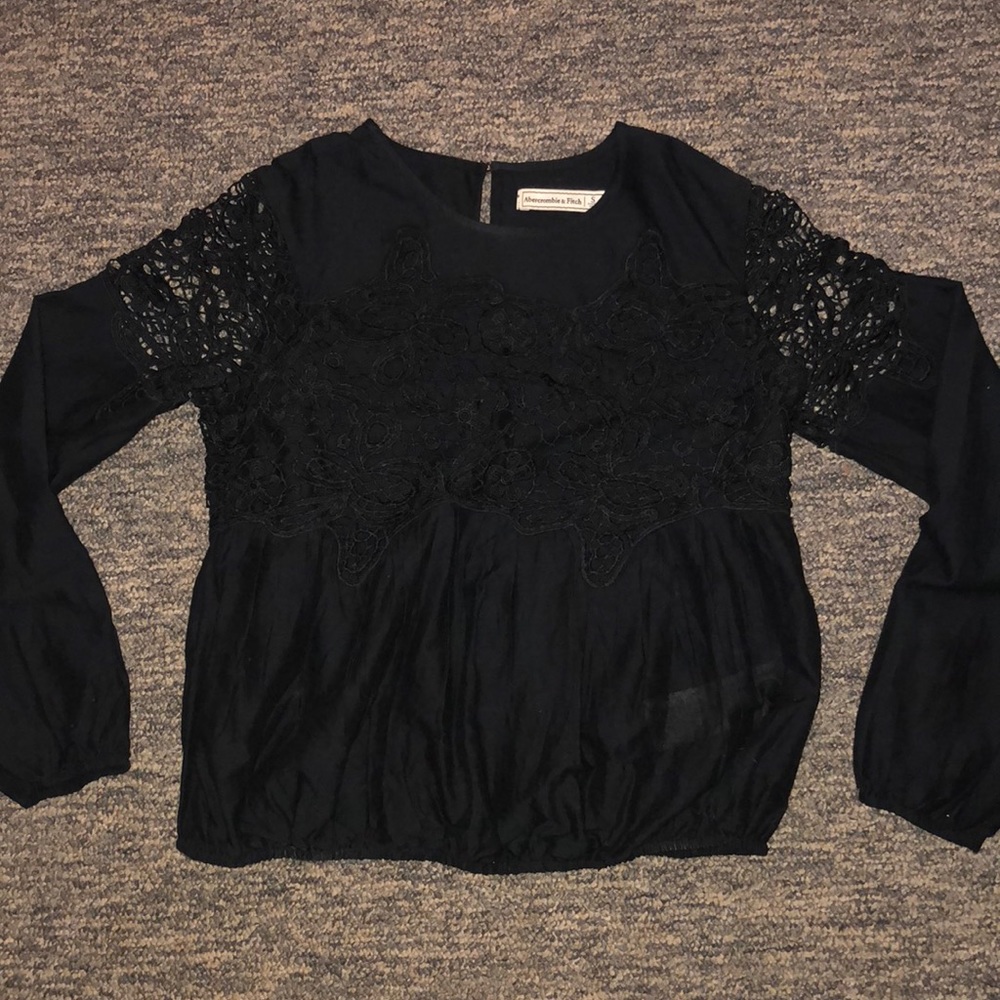 Black lace top with fitted bottom and sleeves